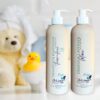 "Plant-based orange and lavender baby shampoo, body wash, and lotion in biodegradable wheat straw bottles, made with organic ingredients, gentle for sensitive skin."